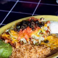 Chimichanga · A flour tortilla filled with shredded beef or chicken, cheddar and jack cheese, Mexican rice...