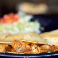 Grilled Quesadilla · Our flour tortilla filled with pico de gallo, melted cheese and your choice of seasoned stea...
