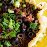 Taco Salad · Shredded lettuce, tomato, black olives, cheese, and scallions topped with your choice of bee...