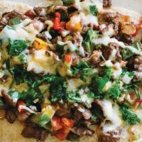 Alambres · Your choice of meat, sautéed with bell peppers and onions over five corn tortillas and toppe...