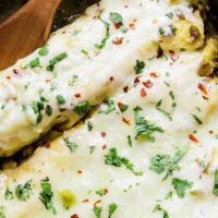 Vegetarian Enchiladas · Four soft rolled corn tortillas filled with cheese and covered with your choice of homemade ...