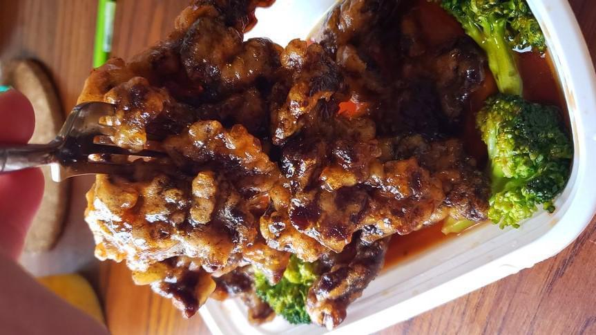 Orange Flavored Beef · Hot & Spicy. Chunks of beef with orange peel in spicy sauce.