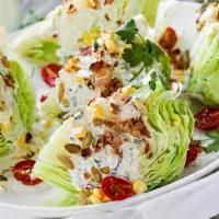 The Wedge · Gluten-free friendly. A wedge of crisp romaine, blue cheese dressing, smoked bacon, grape to...