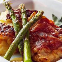 Chicken Saltimbocca · Boneless chicken breast seared with prosciutto and fresh sage, white wine, butter, grilled a...
