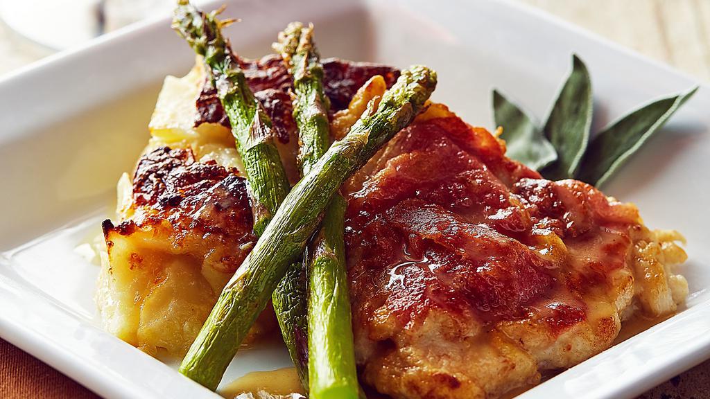 Chicken Saltimbocca · Boneless chicken breast seared with prosciutto and fresh sage, white wine, butter, grilled asparagus, asiago au gratin potatoes.