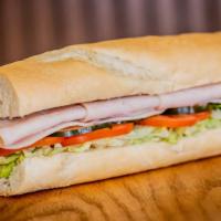 Turkey Breast Sub · All white meat. Includes cheese, lettuce, tomato, onion, pickle, oil and spice.