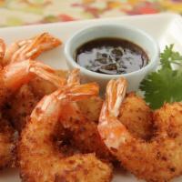5 Coconut Shrimp · Battered shrimp deep fried with shredded sweet coconut.