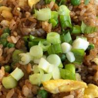 12. Basil Fried Rice · Fried rice with egg, onion, green bean, bell pepper and basil.