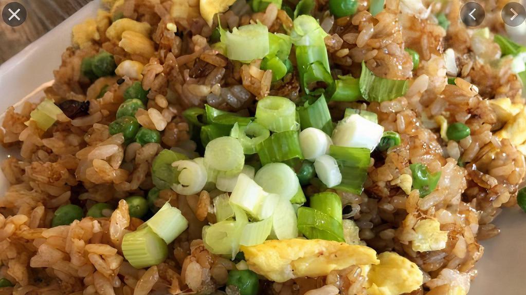 12. Basil Fried Rice · Fried rice with egg, onion, green bean, bell pepper and basil.