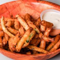 Zucchini Fries · Thin strips of zucchini battered and fried. Served with ranch