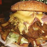 The Thurman Burger · Our head honcho 12oz burger overloaded with ham, sautéed onions & mushrooms, mozzarella & Am...