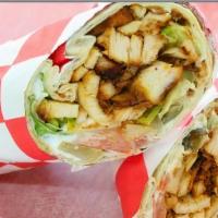 Chicken Shawarma · Charbroiled marinated chicken with lettuce, tomatoes, pickles and garlic sauce.