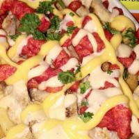 Freaky Fries Bowl · Steak fries topped with chicken shawarma, jalapeños, nacho cheese, spicy mayo and hot Cheetos.