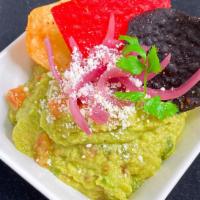 Guacamole & Chips · A delicious avocado, fresh tomatoes, Spanish onions, cilantro, jalapeño, and freshly squeeze...
