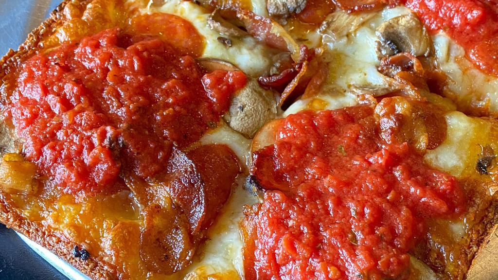 Sm Detroit Classic · Four slices covered with apple-wood smoked bacon, old world pepperoni and fresh mushrooms. All pizzas are fresh and made to order.