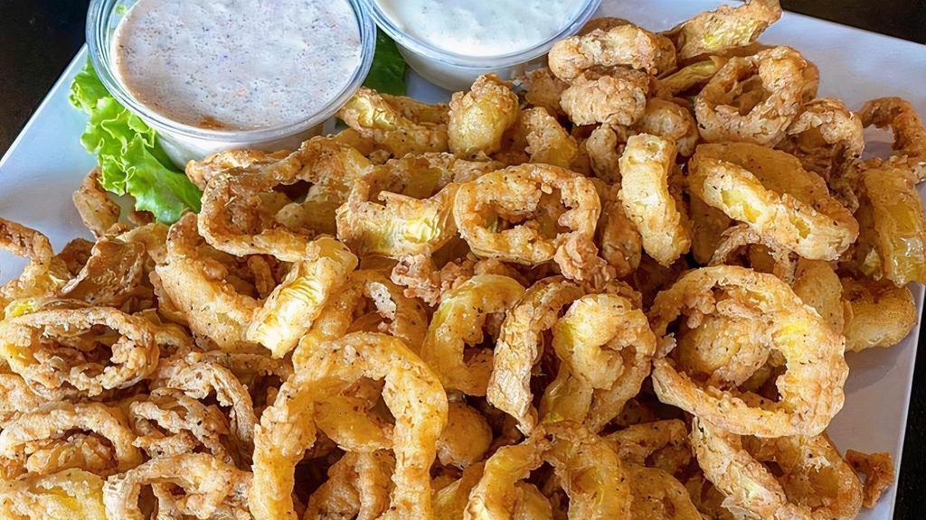 Fried Pepper Rings · Hand breaded banana pepper rings flash fried and served with ranch for dipping.