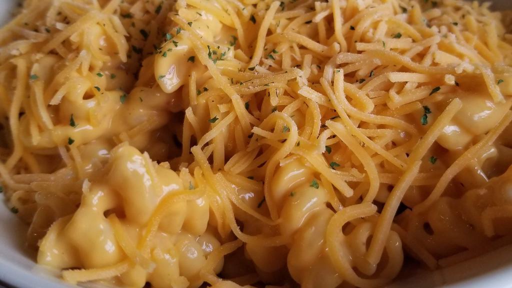 Create A Mac · Our famous mac & cheese as the base and you add your favorite toppings.