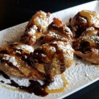 Deep Fried Oreos · Six hand-battered oreos deep fried to perfection and topped with a drizzle of chocolate sauc...