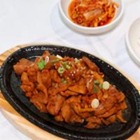 Pork Bulgogi 🌶️🌶️ · Grilled spicy marinated pork with onions, and green onions.