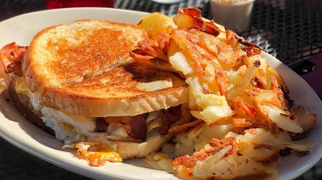 2 Eggs, Bacon  · BACON hashbrowns and toast