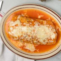 Suizo Dinner Burrito · With beans, lettuce, cheese, tomato and sour cream. Topped with cheese. Served with rice and...