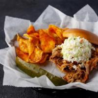 Memphis Pulled Pork · A delicious southern tradition…mounds of coleslaw atop a pulled pork sandwich (on the side f...