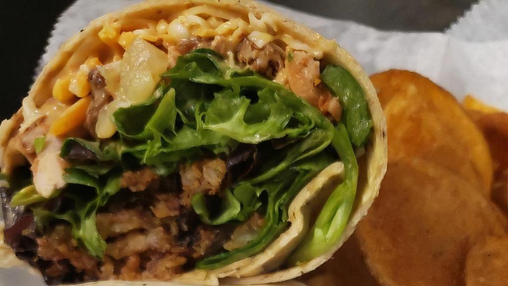 Beef & Cheddar Wrap · Sliced beef brisket, cheddar cheese, curley ques, greens and barbecue cheddar dressing.