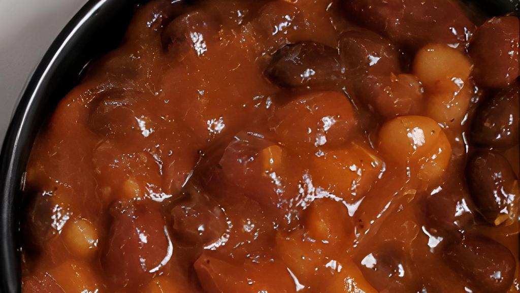 Barbecue Beans W/ Smoked Pork · Housemade Signature Smoked Barbecue Beans with Smoked Pork.