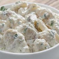 Smokehouse Potato Salad · A hearty potato salad loaded with freshly diced potatoes, smoked bacon, scallions and chives...