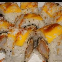 Mango Shrimp Roll · Shrimp tempura with mango on top.
