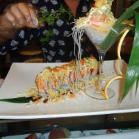 Geist Roll · Asparagus, shrimp tempura, cream cheese atop of salmon, tuna, yellowtail, and crab meat, tem...