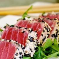 Sesame Tuna · Sesame crusted sushi-grade tuna finished with wasabi aioli served with soup salad and white ...