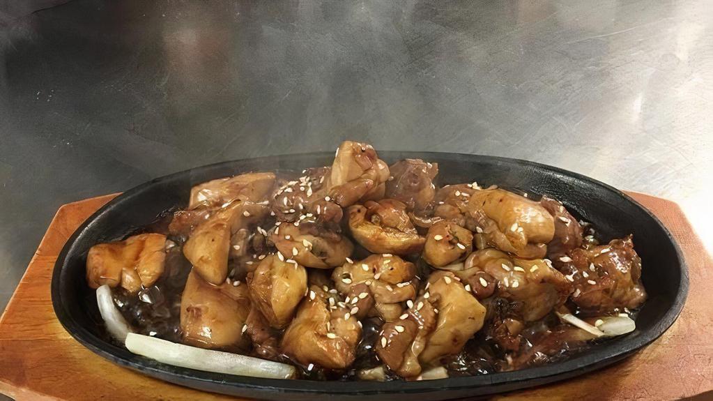 Chicken Sizzling Plate · Hibachi-style dinner served with soup salad and white rice.