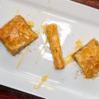 Baklava · Finely crushed walnuts, pistachios, or cashews, sugar and cinnamon delicately baked between ...