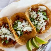 Tacos · Topped with: onion and cilantro or lettuce, tomato and cheese.