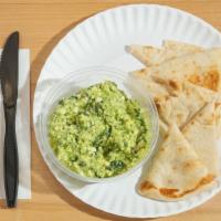 Spinach Feta Dip · Fresh baby spinach, Feta cheese, onions, and extra virgin olive oil. Served with 1 fresh pit...