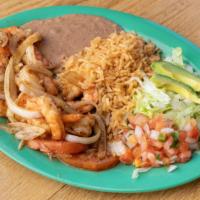 Grilled Shrimp · Grilled shrimp, onions, and tomatoes, served with rice, beans, pico de gallo, lettuce, avoca...