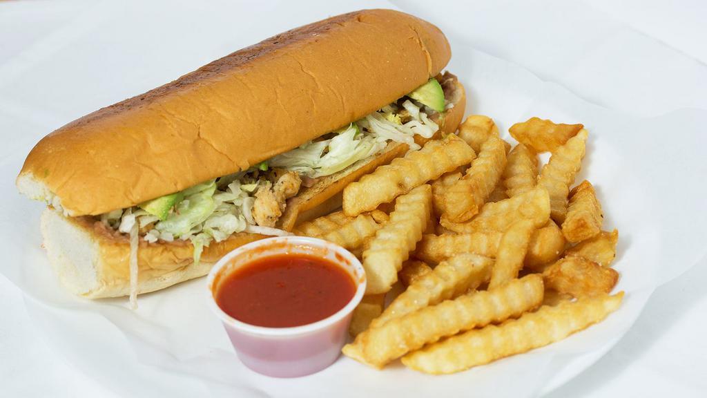 Torta · Mexican bread sandwich filled with beef or chicken, beans, cheese, mayonnaise, Lettuce, tomatoes and avocado. Side: French fries.
