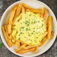 Cheese Fries · (Vegetarian) Idaho potato fries cooked until golden brown and garnished with salt and melted...