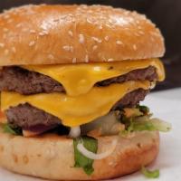 Classic Cheeseburger · 5 Oz. (1/3 pound) of 100% fresh Beef Burger, Melted American Cheese, Lettuce, Pickle, tomato...