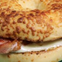 Cheesy Joe · Asiago Cheese Bagel with a Fried Egg, 2 Slices of Bacon and Sharp Cheddar Cheese!