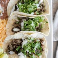 Taco Dinner · 3 tacos choice of meat, chicken, steak, pastor, and chorizo, ground beef and cilantro, onion...
