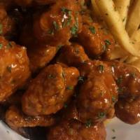 Boneless Wings · Original recipe hand battered boneless wing dinners. come with fries drink and toasted bread