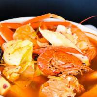 Caldo 7 Mares · Soup combination of shrimp, fish, octopus, mussels, crab legs, scallops, and oysters with a ...