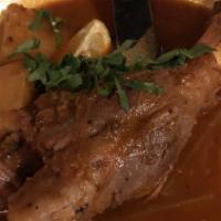 Lamb Shank · Simmered with carrots, potatoes, celery, tomatoes and garlic.