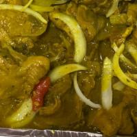 Jamaican Curry Chicken With White Rice · Various chicken pieces (leg thigh) seasoned with jamaican curry garlic onions scallions pepp...