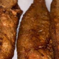 Haitian Fried Fish · Well seasoned whole snapper or butter fish lightly floured and fried to a golden brown perfe...