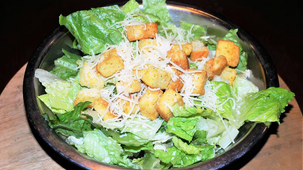Caesar Salad Regular · Romaine Lettuce, Croutons, and Shredded Parmesan Cheese served with a Classic Caesar Dressing.