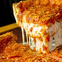 Small Deep Dish Meat Eater'S Deluxe. · Italian Sausage, Canadian Bacon, Pepperoni and Ground Beef