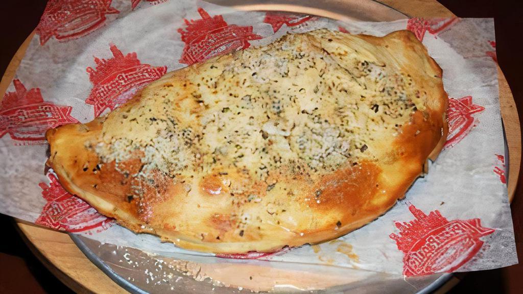 Meatball Calzone · Housemade Papalis Meatballs, Marinara Sauce and Mozzarella Cheese
